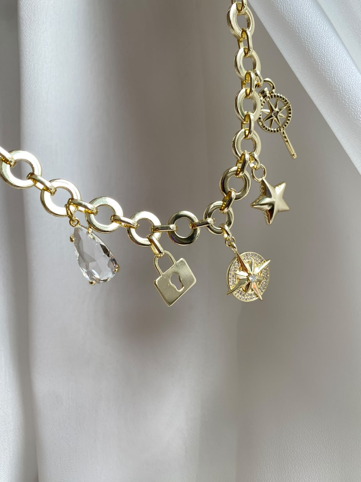 Poles star charm choker