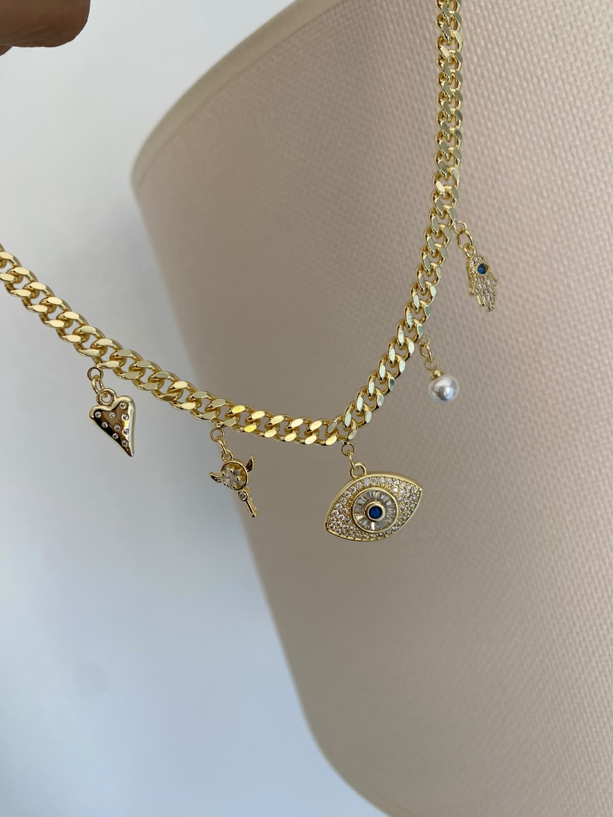 Eyes & inci charm choker