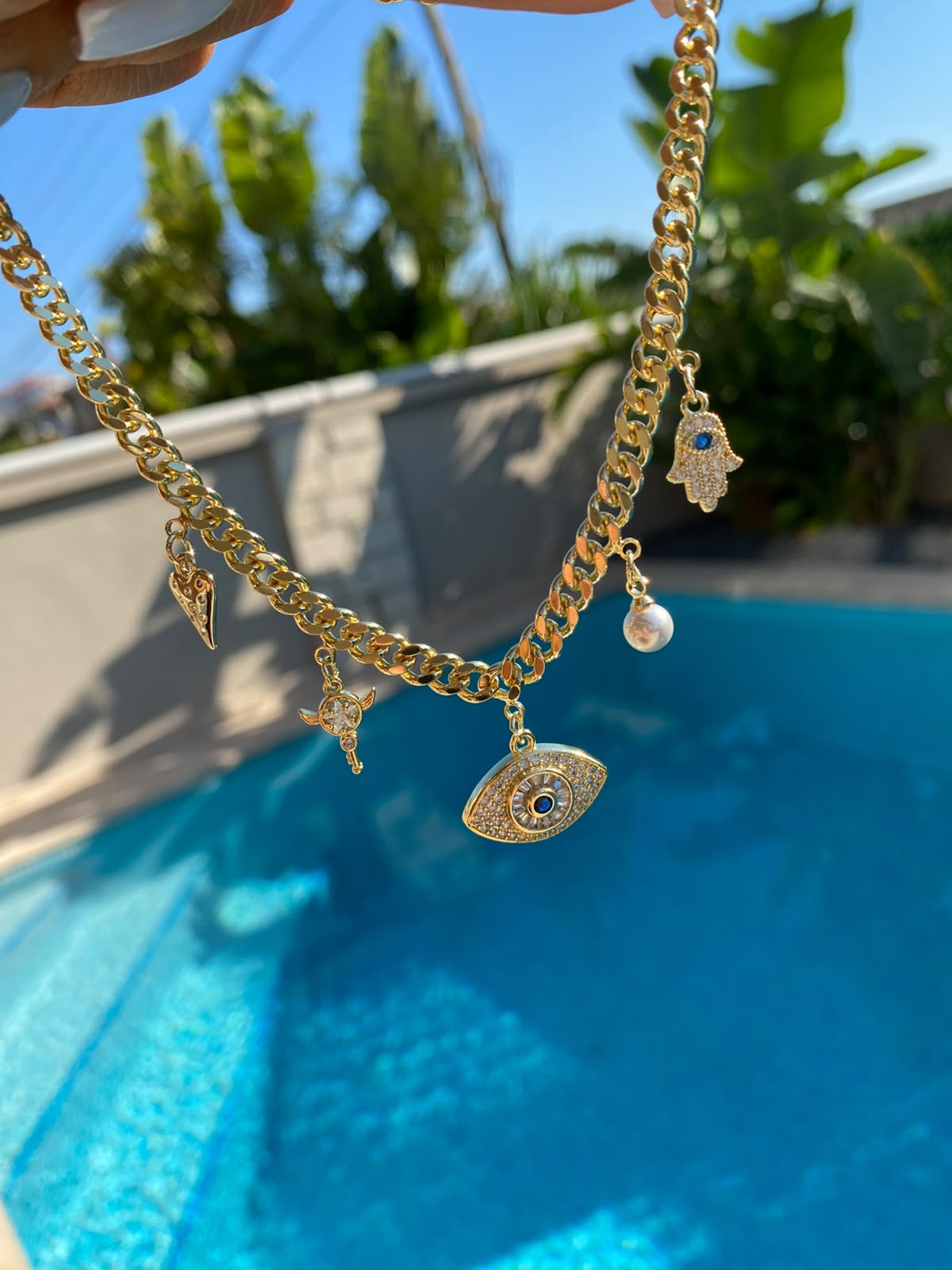 Eyes & inci charm choker